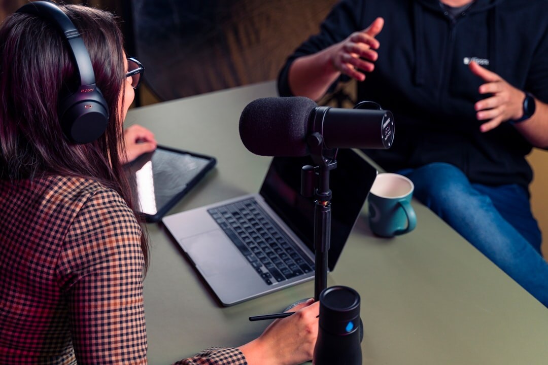 Professional podcast recording session with microphones
