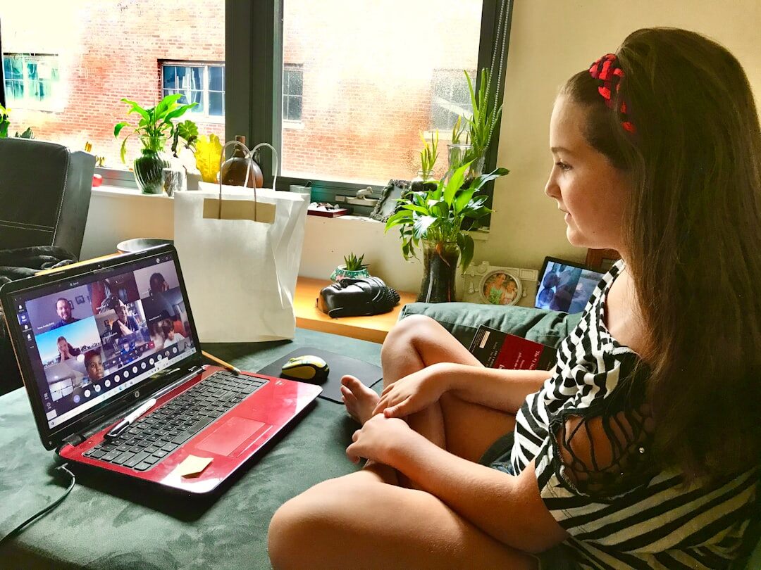 Online learning group with laptops and tablets